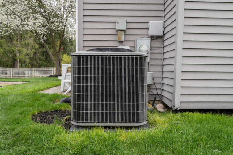 central air installation-central ac unit outside of a residential home