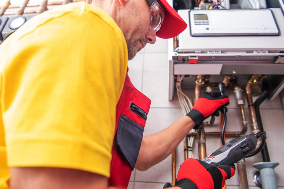 tankless water heater installation-tech installing and testing new water heater system