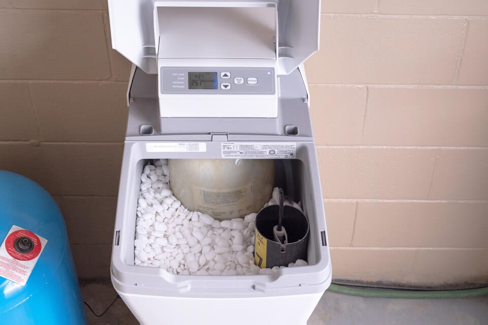 best water softener salt-overhead view of water softener full of pellets