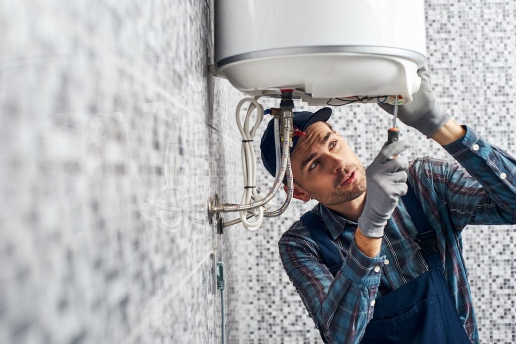 person installing new boiler