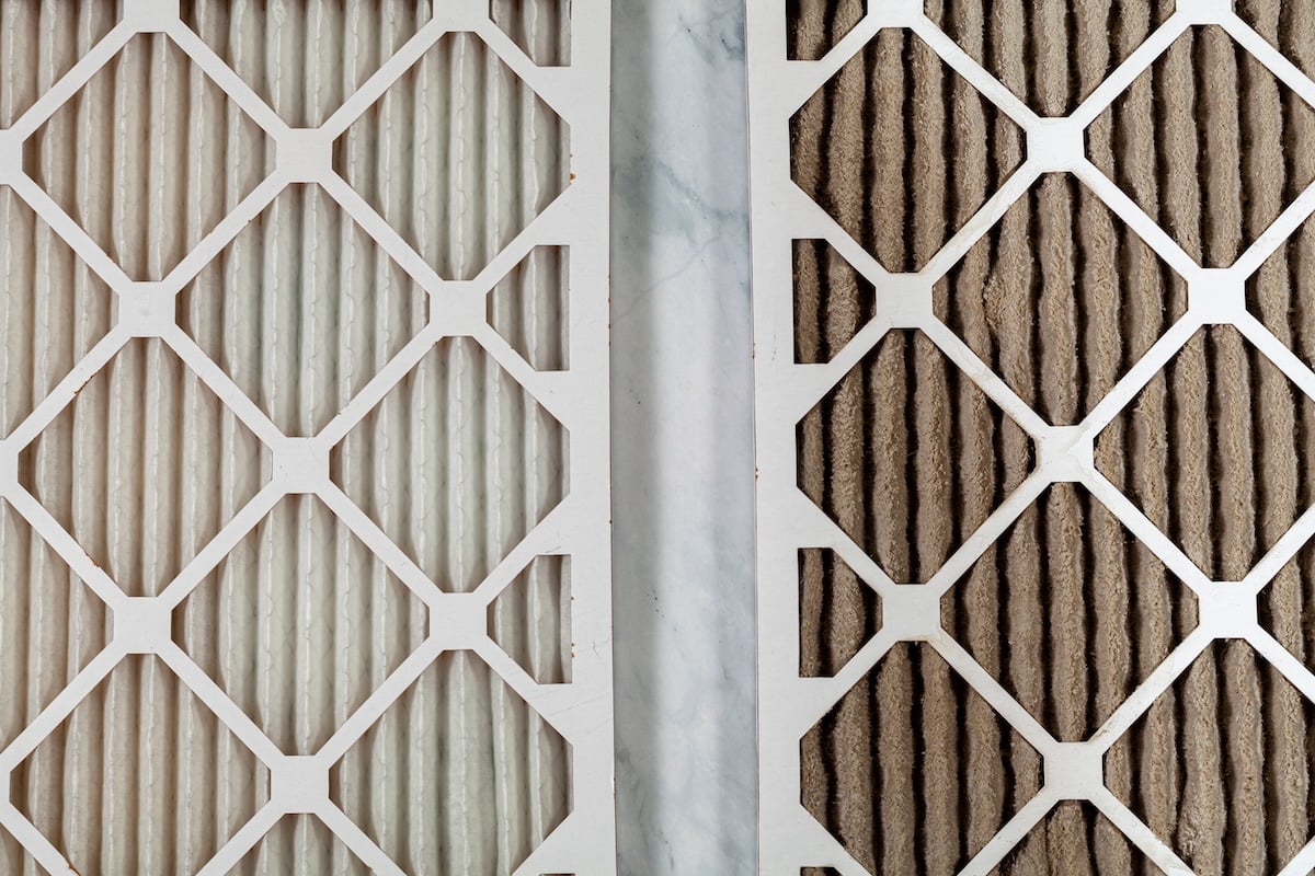 Side by side close up view of a new unused and an old heavily clogged dirty air filters. Image emphasizes the role of framed filters in improving air quality and preventing respiratory problems.