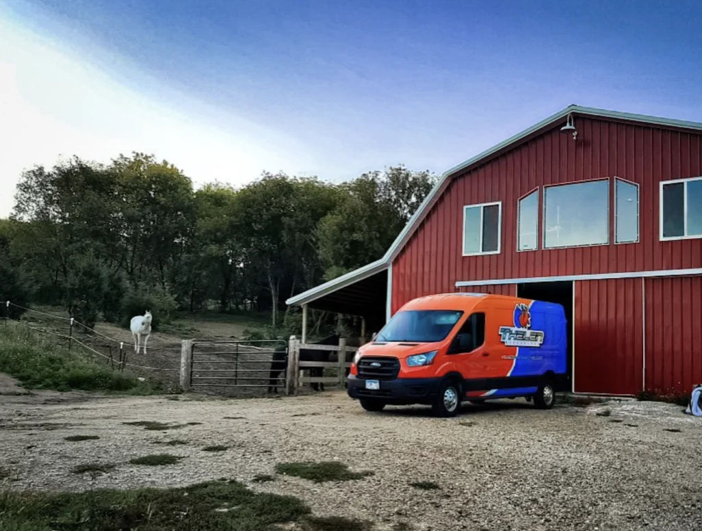 thelen work van outside of a home near Big Lake, MN